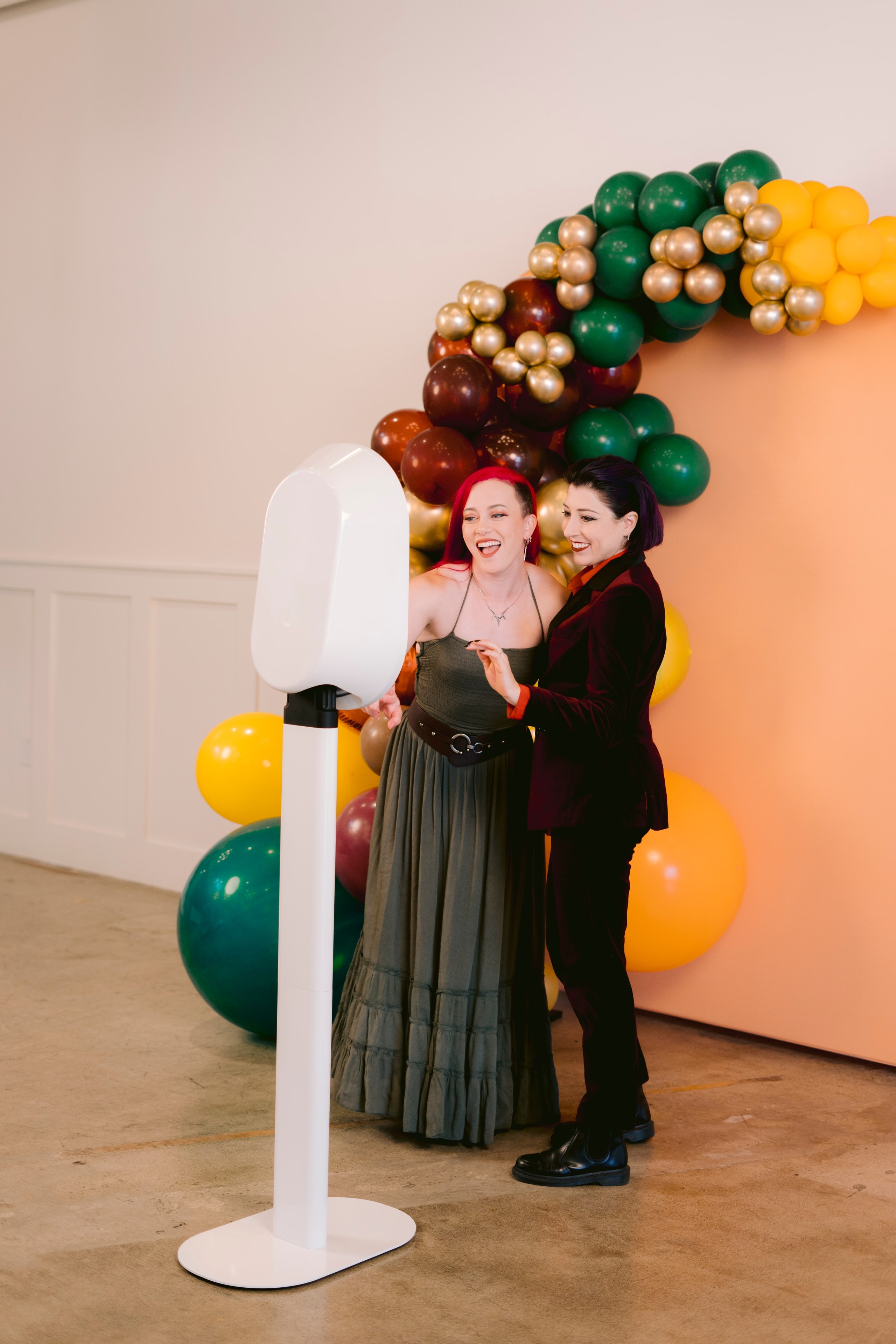 Self-service digital photo booth setup at a Bay Area event