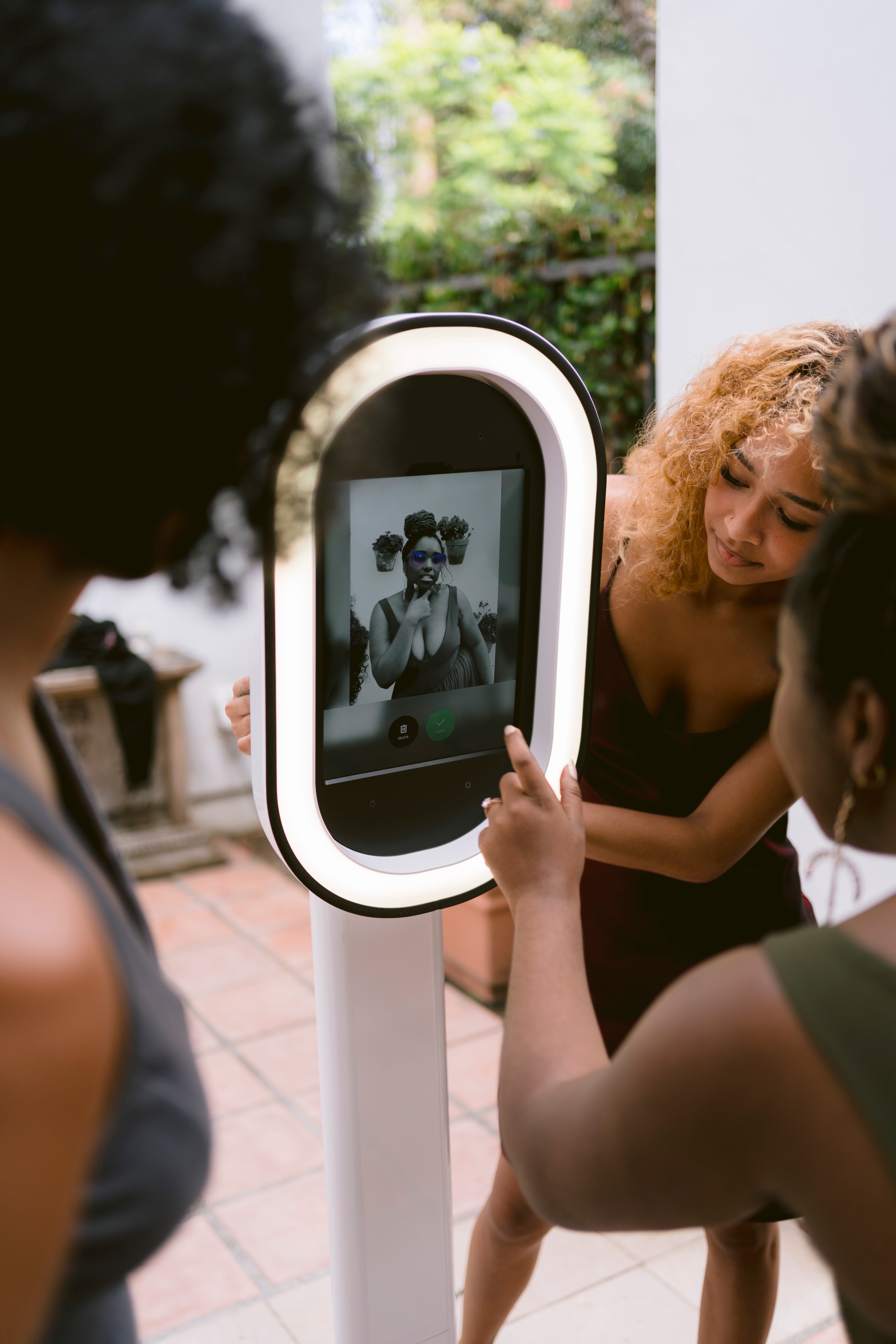 Guests using a self-service digital photo booth